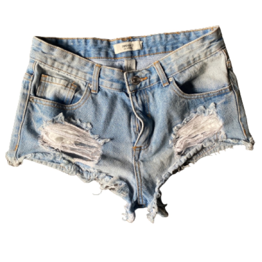 Raw hem denim shorts with fringe